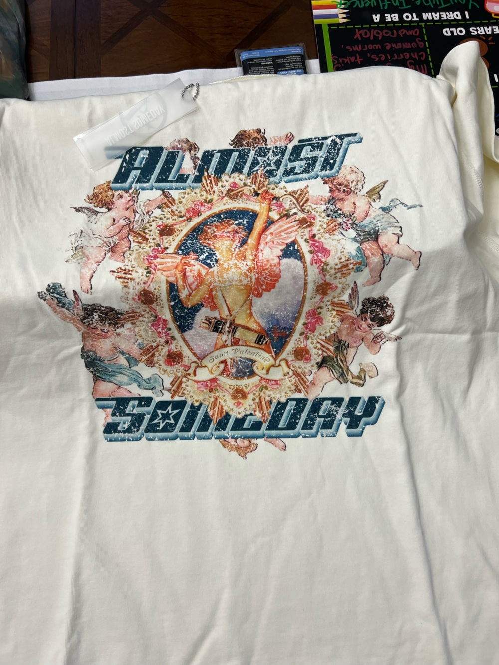 Vintage-Inspired Cherub Graphic Long Sleeve Tee - White